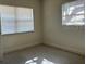 A simple bedroom with natural lighting from the two windows at 2886 Carew Ave, Winter Park, FL 32789