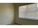 Bright bedroom featuring a large window and neutral tones providing a serene space at 2886 Carew Ave, Winter Park, FL 32789