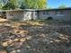Rear view of a home with a spacious backyard, offering outdoor living and entertaining possibilities at 2886 Carew Ave, Winter Park, FL 32789