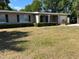 Single-story home with tidy landscaping, covered entryway, and attached garage for convenience and curb appeal at 2886 Carew Ave, Winter Park, FL 32789