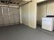 Spacious garage featuring a door and laundry area, providing convenience and functionality at 2886 Carew Ave, Winter Park, FL 32789