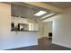 Modern kitchen featuring stainless steel appliances, white cabinets, sleek countertops, and an open-concept design at 2886 Carew Ave, Winter Park, FL 32789