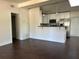 Modern kitchen featuring stainless steel appliances, white cabinets, sleek countertops, and an open-concept design at 2886 Carew Ave, Winter Park, FL 32789