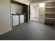 A laundry room features a washer and dryer set and shelving at 2886 Carew Ave, Winter Park, FL 32789