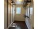 Walk-in closet offering ample storage with built-in shelving and hanging racks at 2886 Carew Ave, Winter Park, FL 32789