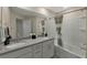 Bathroom featuring a dual sink vanity and shower/tub combo at 2956 Oak Park Way # B, Orlando, FL 32822