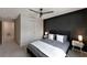 A spacious bedroom featuring a ceiling fan, closet, and stylish furniture at 2956 Oak Park Way # B, Orlando, FL 32822