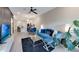 Open-concept living room and kitchen with modern decor, furniture and decor at 2956 Oak Park Way # B, Orlando, FL 32822