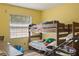 Cozy bedroom with a bunk bed, providing a comfortable and versatile living space at 3041 Dikewood Ct, Winter Park, FL 32792