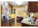 Functional kitchen featuring wood cabinets, modern stainless steel appliances and an eat-in area at 3041 Dikewood Ct, Winter Park, FL 32792