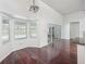 Bright breakfast nook with ample windows, hardwood floors, and access to the backyard at 308 Pine Shadow Ln, Lake Mary, FL 32746
