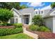 Charming front entrance featuring a well-maintained lawn and inviting walkway leading to the front door at 308 Pine Shadow Ln, Lake Mary, FL 32746