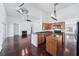 Open-concept kitchen adjacent to the living area, offering an island and modern appliances at 308 Pine Shadow Ln, Lake Mary, FL 32746