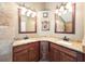 Close up of main bathroom with double vanity and walk-in shower in the background at 308 Pine Shadow Ln, Lake Mary, FL 32746
