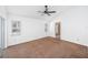 Bright main bedroom with ceiling fan, and a bathroom en suite at 308 Pine Shadow Ln, Lake Mary, FL 32746
