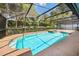 A screened-in pool offers a private outdoor space at 308 Pine Shadow Ln, Lake Mary, FL 32746