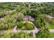 An aerial view of the property nestled amongst mature trees at 3420 Dawn Ct, Lake Mary, FL 32746
