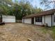 Backyard showing additional storage and a detached garage at 3420 Dawn Ct, Lake Mary, FL 32746