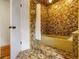 Retro bathroom showcasing unique tilework, tub, and vintage fixtures at 3420 Dawn Ct, Lake Mary, FL 32746
