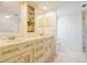 Bright bathroom with custom cabinets, dual sinks, soaking tub, and glass enclosed shower at 3420 Dawn Ct, Lake Mary, FL 32746