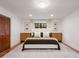 Bright bedroom featuring a comfortable bed, stylish decor, and an abundance of natural light from the windows at 3420 Dawn Ct, Lake Mary, FL 32746