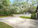 Wide driveway leading to charming home with meticulously maintained lawn at 3420 Dawn Ct, Lake Mary, FL 32746
