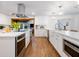 Bright kitchen features a large island, stainless steel appliances, and white cabinetry at 3420 Dawn Ct, Lake Mary, FL 32746