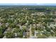 An aerial view highlighting a quiet residential neighborhood, filled with mature trees and inviting homes at 356 Oakhurst St, Altamonte Springs, FL 32701