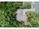 Birds eye view of a home with a gray roof surrounded by lush greenery at 356 Oakhurst St, Altamonte Springs, FL 32701