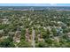 A wide aerial perspective features a tranquil neighborhood and its lush landscape and well-maintained roads at 356 Oakhurst St, Altamonte Springs, FL 32701