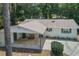 Aerial view of a home with a covered parking area, a patio, and a well-maintained yard at 356 Oakhurst St, Altamonte Springs, FL 32701