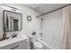 Bright bathroom featuring a mirror, toilet, shower with curtain, and a single vanity sink at 356 Oakhurst St, Altamonte Springs, FL 32701