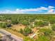 Expansive aerial view of property showcasing the home and surrounding landscape at 38241 County Road 439, Eustis, FL 32736
