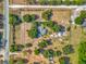 Expansive property featuring a well-maintained home, mature trees, fenced in areas, and road access, providing a tranquil setting at 38241 County Road 439, Eustis, FL 32736