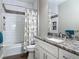Bathroom features white subway tile in the shower/tub area, and granite countertops at 39 Lake Dr, Debary, FL 32713