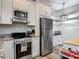 Modern kitchen with stainless steel appliances and ample counter space at 39 Lake Dr, Debary, FL 32713