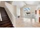 Bright open-concept living space with a fireplace and backyard views at 3904 Woodsfield Ct, Orlando, FL 32822