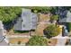 A high-angle aerial perspective of a home showcasing the backyard and surrounding neighborhood at 418 W Princeton St, Orlando, FL 32804