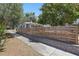 Charming home with a horizontal wood fence, landscaped yard and brick accents at 418 W Princeton St, Orlando, FL 32804