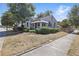 Charming home with awnings, landscaped yard and beautiful trees at 418 W Princeton St, Orlando, FL 32804
