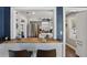 Modern kitchen with stainless steel appliances and a cozy breakfast bar with seating at 418 W Princeton St, Orlando, FL 32804