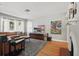 Bright living room with hardwood floors, comfortable seating, and a decorative fireplace at 418 W Princeton St, Orlando, FL 32804
