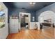 Spacious living room with hardwood floors, classic archways, and natural light at 418 W Princeton St, Orlando, FL 32804
