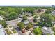 Street view featuring a charming home with lush green trees in a vibrant neighborhood setting at 418 W Princeton St, Orlando, FL 32804