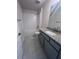 Modern bathroom featuring a tiled shower-tub combination and a granite vanity at 4264 Sagefield Dr, St Cloud, FL 34773