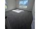 Well-lit bedroom with neutral carpeting and a large window offering natural light at 4264 Sagefield Dr, St Cloud, FL 34773