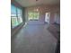 Bright dining area with tile flooring and large windows overlooking the backyard at 4264 Sagefield Dr, St Cloud, FL 34773