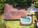 Aerial view of the house showing the pool, roof, yard, and neighborhood at 429 Kimberly Ct, Sanford, FL 32771