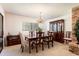 Elegant dining room featuring a chandelier and wooden dining set at 429 Kimberly Ct, Sanford, FL 32771