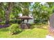 Secluded gazebo in backyard with lush landscaping and mature trees at 429 Kimberly Ct, Sanford, FL 32771